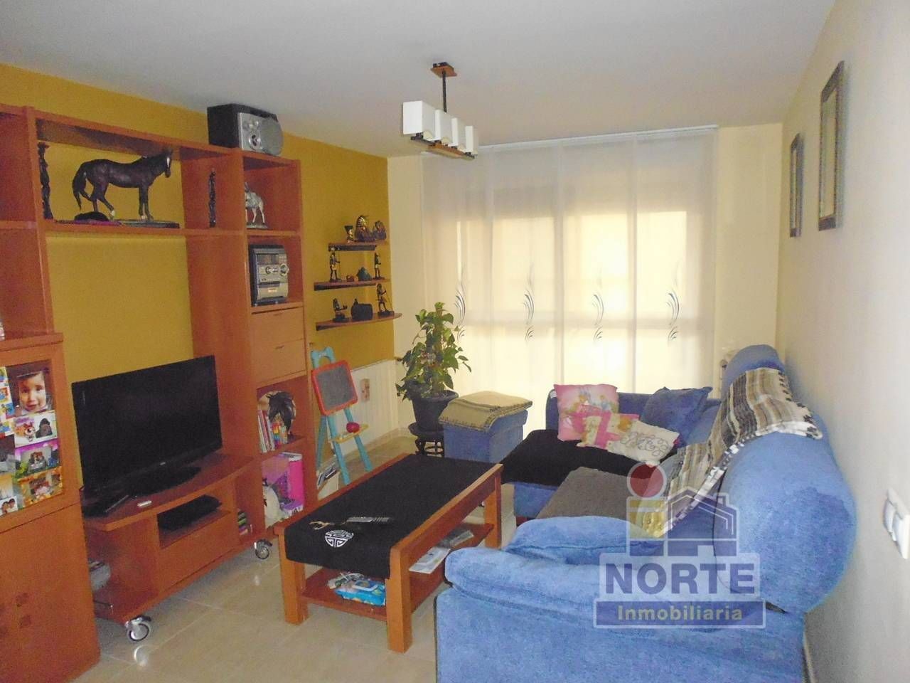 Sala d'estar de Casa adosada en venda en L'Alqueria d'Asnar amb Calefacció i Terrassa
