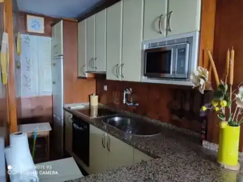 Cuina de Apartament de lloguer en Almuñécar amb Parquet, Piscina i Moblat