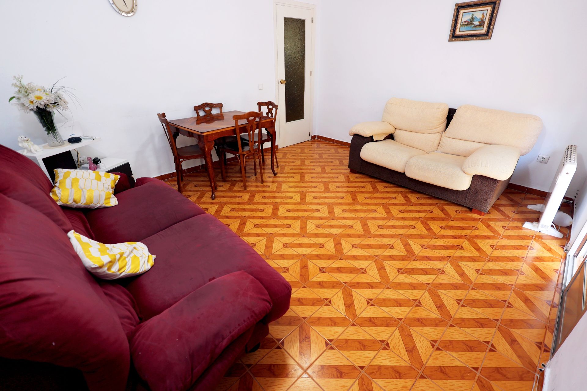 Sala d'estar de Casa adosada en venda en Coslada amb Aire condicionat, Terrassa i Balcó