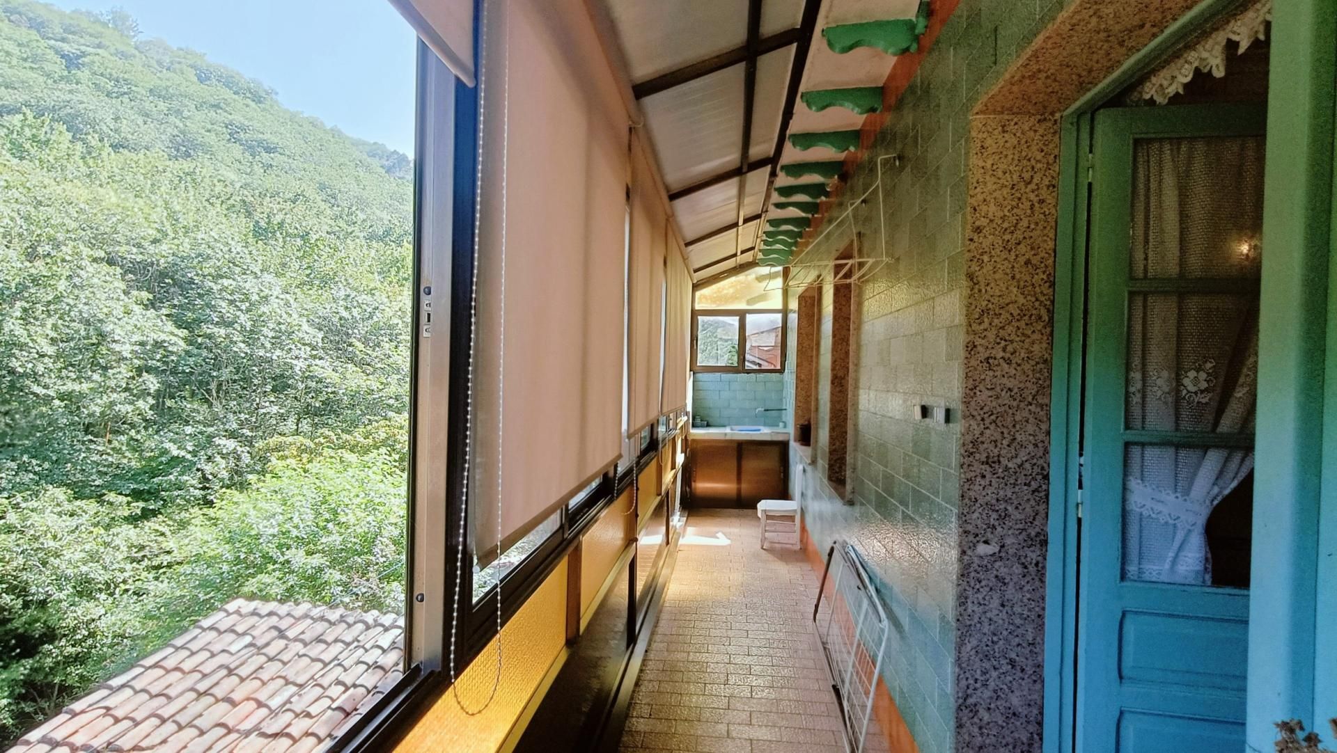 Casa adosada en venda en Langreo amb Calefacció i Terrassa