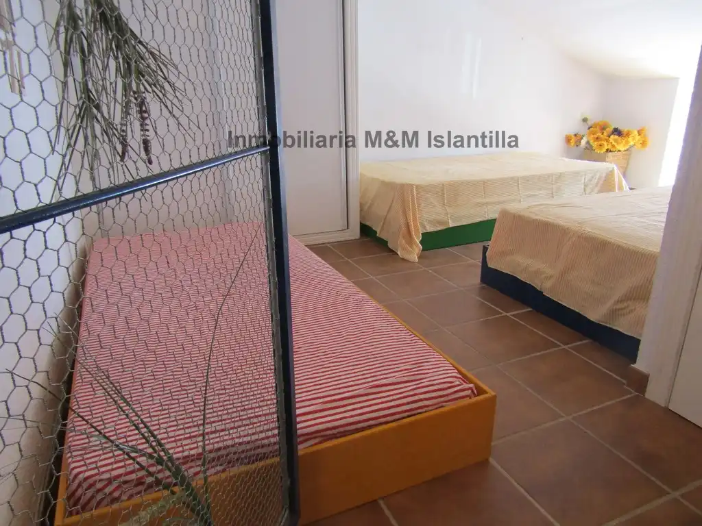 Habitación de Casa adosada en venta en Islantilla con Terraza, Trastero y Amueblado