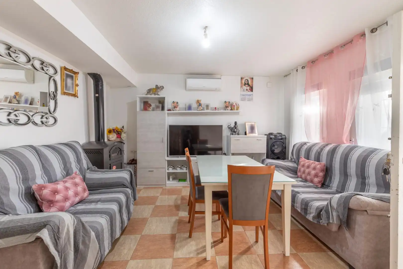 Sala de estar de Casa adosada en venta en Guadix con Aire acondicionado y Terraza