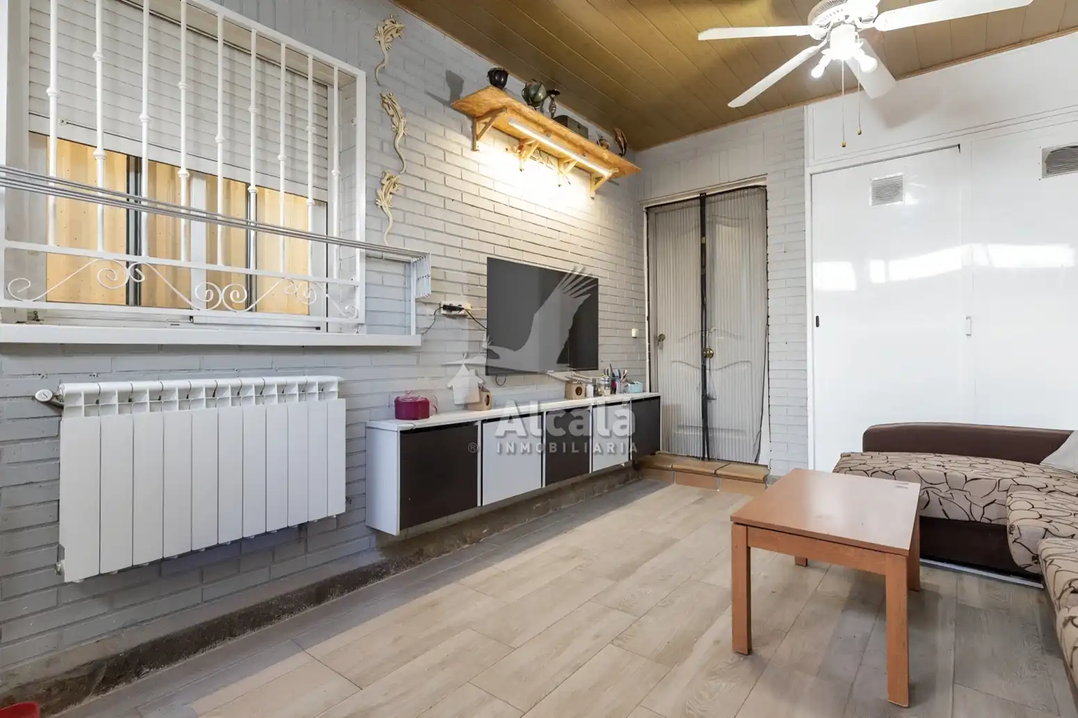 Sala de estar de Casa adosada en venta en Valdeavero con Aire acondicionado, Calefacción y Jardín privado
