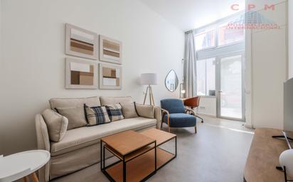 Sala d'estar de Loft de lloguer en  Madrid Capital amb Aire condicionat i Terrassa