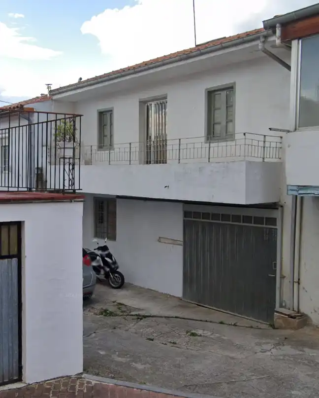Vista exterior de Casa adosada en venda en Torrelavega  amb Balcó