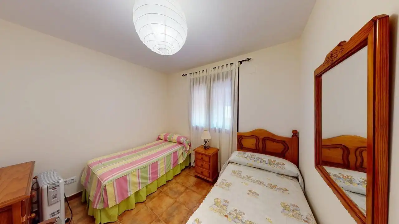 Habitación de Casa adosada de alquiler en Guillena con Aire acondicionado, Calefacción y Jardín privado