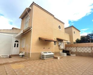 Exterior view of Single-family semi-detached for sale in Torrevieja  with Air Conditioner, Private garden and Terrace