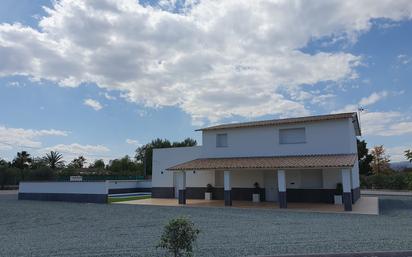 Vista exterior de Casa o xalet en venda en Puerto Lumbreras amb Aire condicionat, Jardí privat i Terrassa