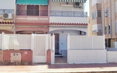 Exterior view of Single-family semi-detached for sale in Santa Pola  with Air Conditioner, Terrace and Balcony