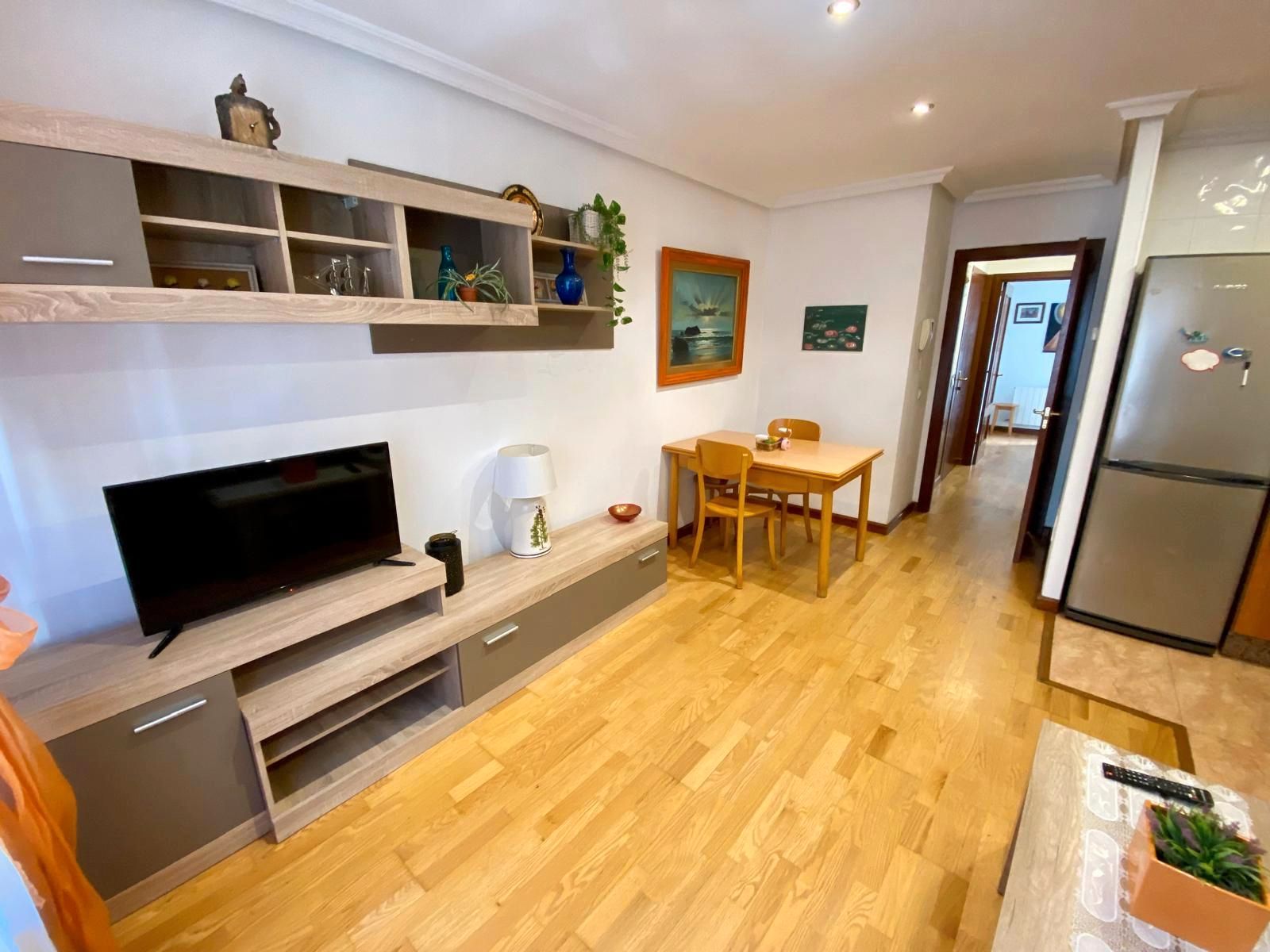 Sala d'estar de Apartament en venda en Gijón  amb Calefacció, Parquet i Terrassa