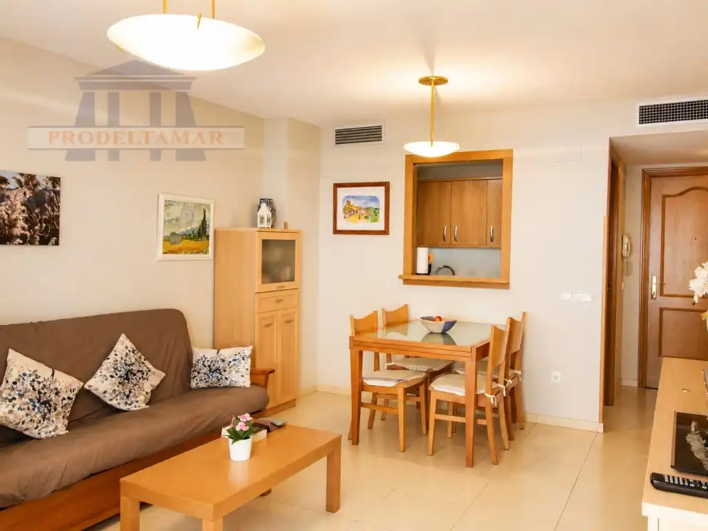 Sala de estar de Apartamento en venta en L'Ampolla con Aire acondicionado, Amueblado y Horno