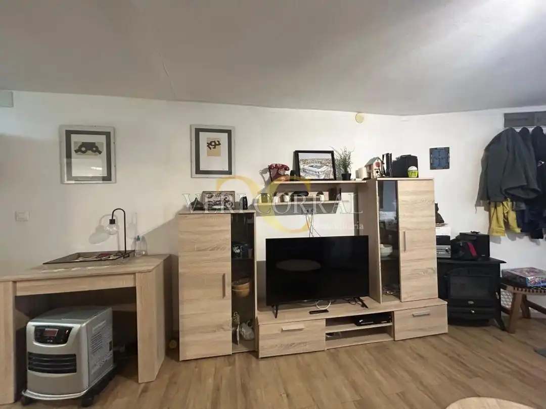 Sala d'estar de Casa adosada en venda en Llanes amb Calefacció i Moblat