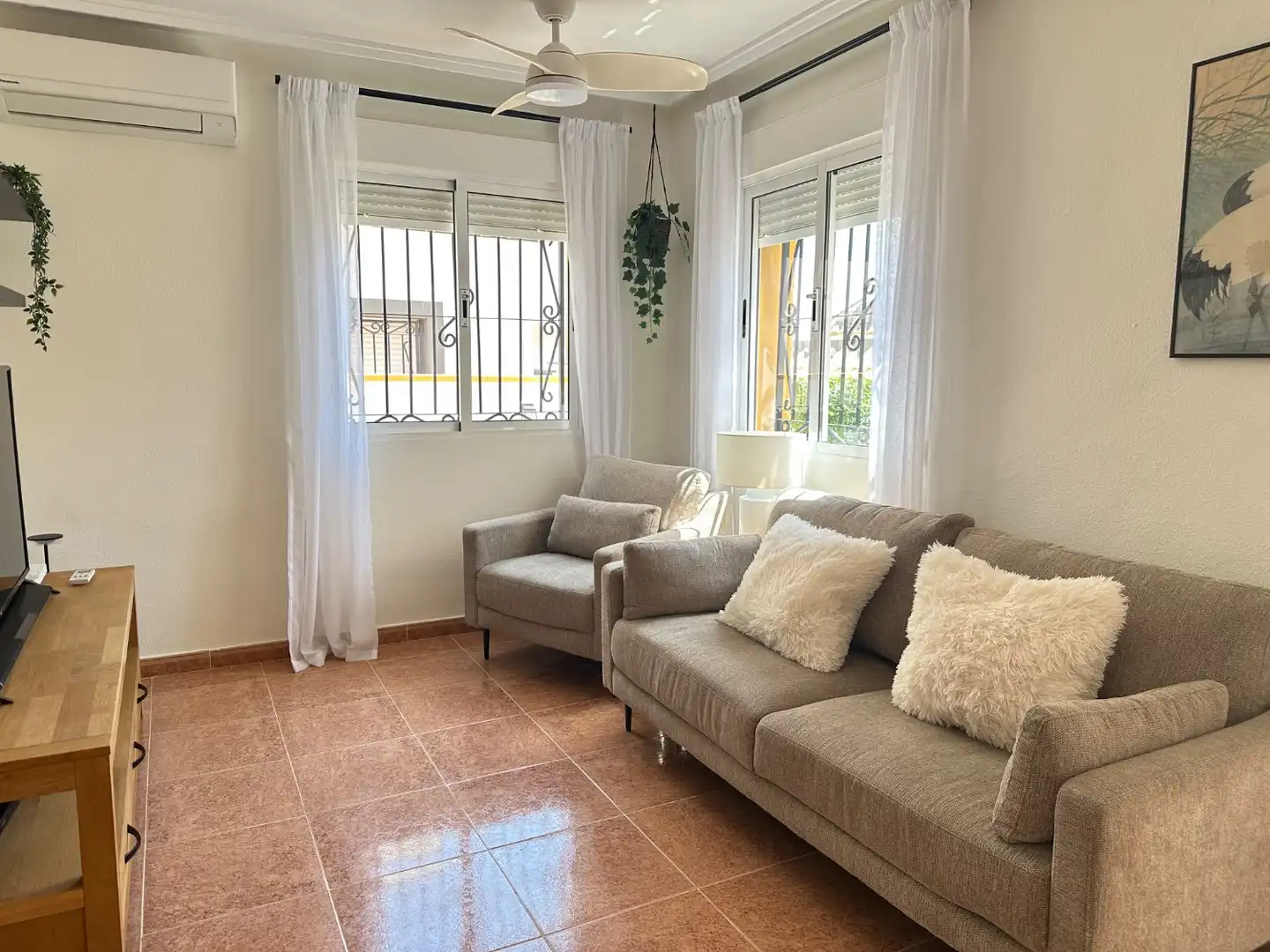 Sala de estar de Casa adosada en venta en Orihuela con Aire acondicionado, Piscina y Amueblado