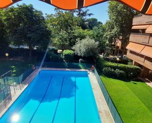 Swimming pool of Duplex for sale in  Madrid Capital  with Air Conditioner