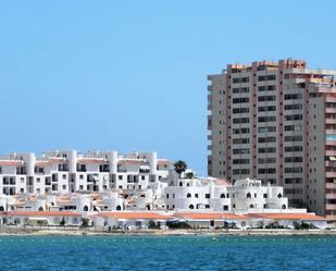 Vista exterior de Casa o xalet en venda en La Manga del Mar Menor amb Terrassa