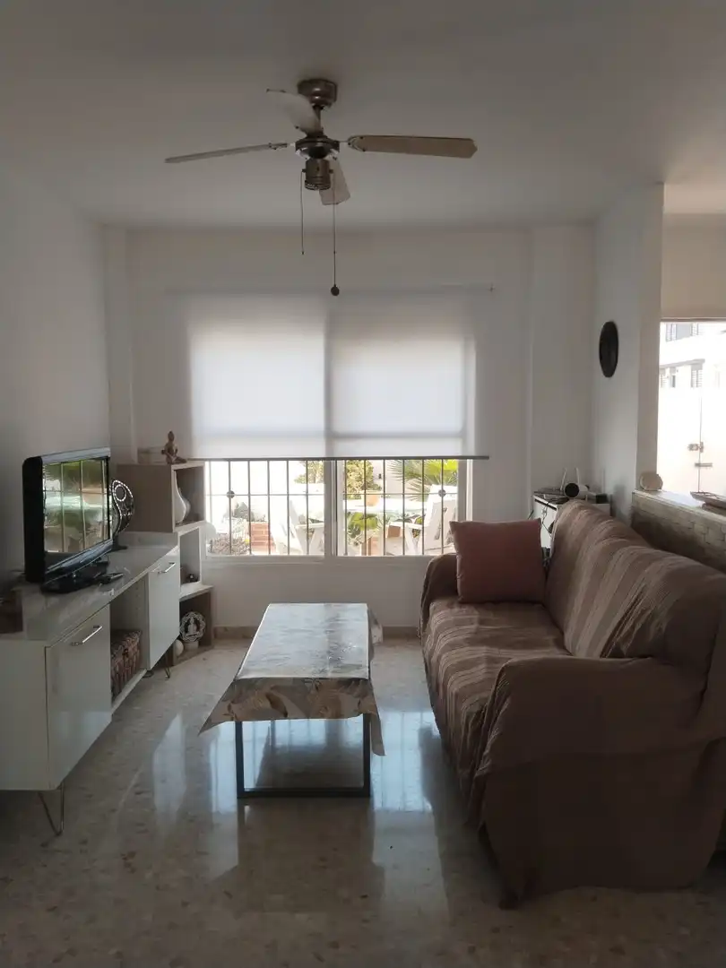 Sala de estar de Casa adosada en venta en Churriana