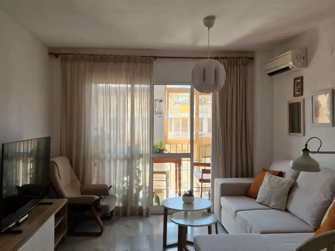 Living room of Flat for sale in Benalmádena  with Air Conditioner and Swimming Pool