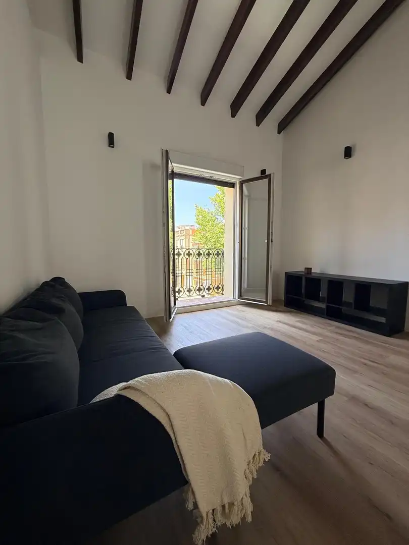 Wohnzimmer von Dachboden zur Miete in Carcaixent mit Balkon