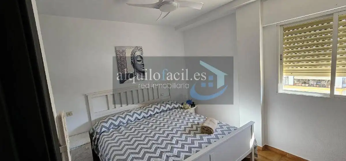 Dormitori de Pis de lloguer en Fuengirola amb Aire condicionat, Calefacció i Terrassa