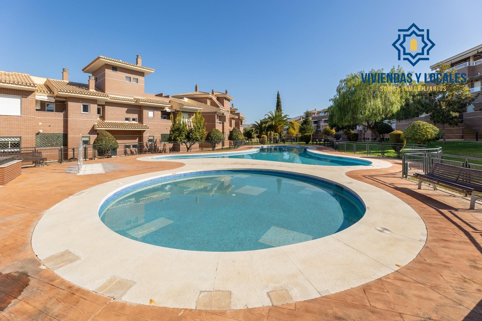 Swimming pool of Flat for sale in La Zubia  with Air Conditioner, Heating and Private garden