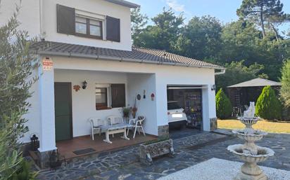 Exterior view of House or chalet for sale in Riells i Viabrea  with Air Conditioner, Heating and Private garden