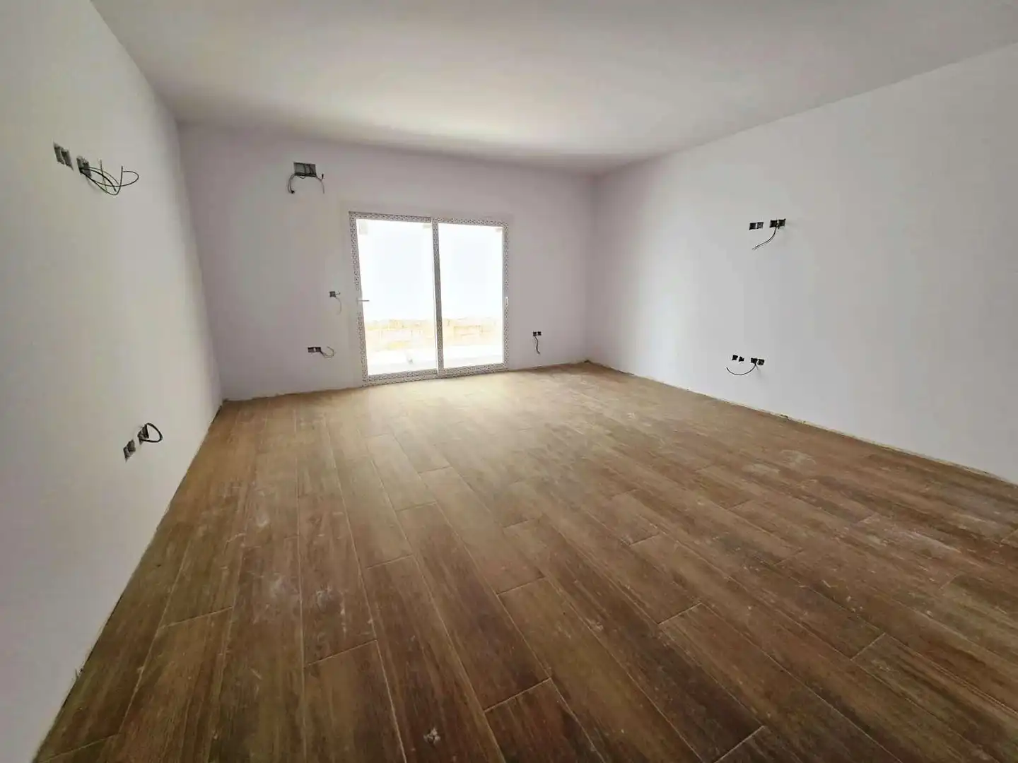 Sala de estar de Casa adosada en venta en Bormujos