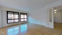 Living room of Flat for sale in  Madrid Capital  with Heating, Private garden and Community pool