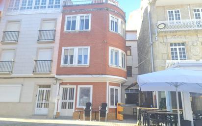 Vista exterior de Casa adosada en venda en Porto do Son amb Balcó