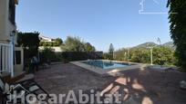 Vista exterior de Casa o xalet en venda en Alzira amb Aire condicionat, Jardí privat i Terrassa