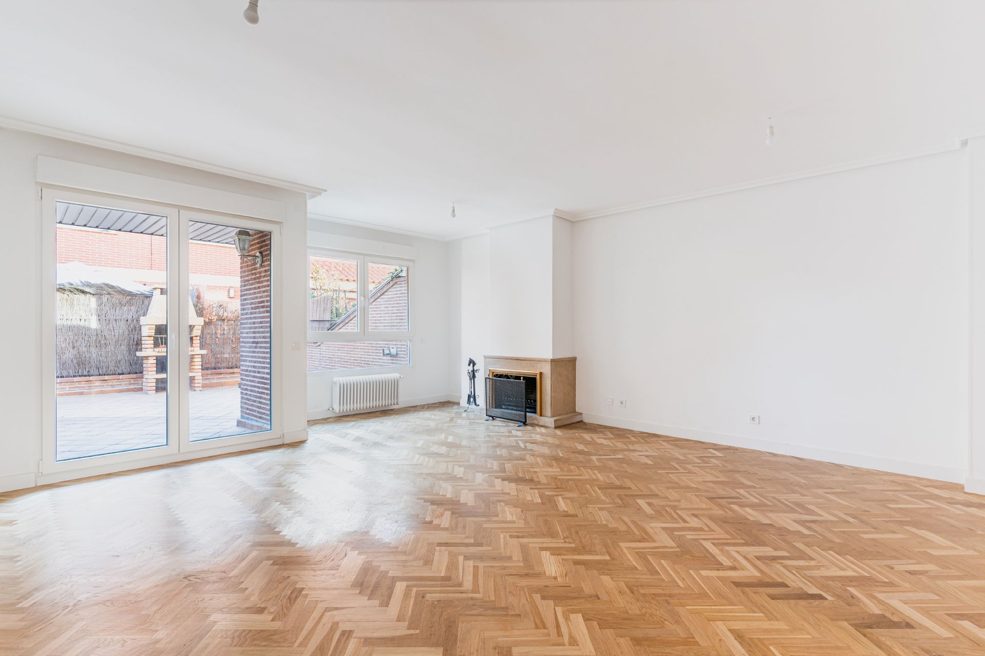 Sala de estar de Casa adosada en venta en Majadahonda con Calefacción, Jardín privado y Piscina