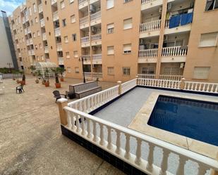 Swimming pool of Apartment for sale in Torrevieja  with Air Conditioner, Terrace and Balcony