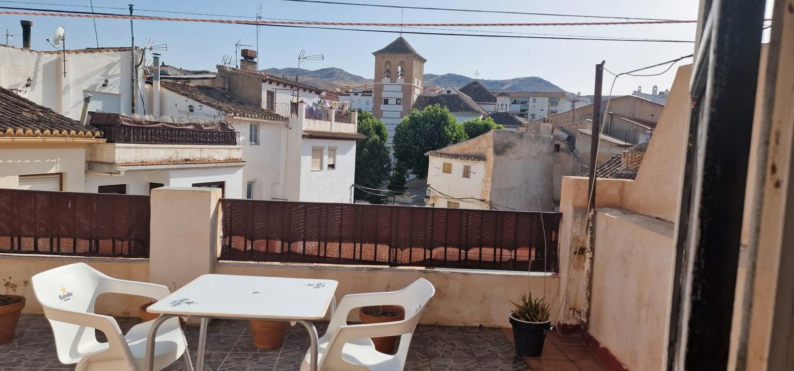 Exterior view of Single-family semi-detached for sale in Baza  with Air Conditioner, Terrace and Storage room