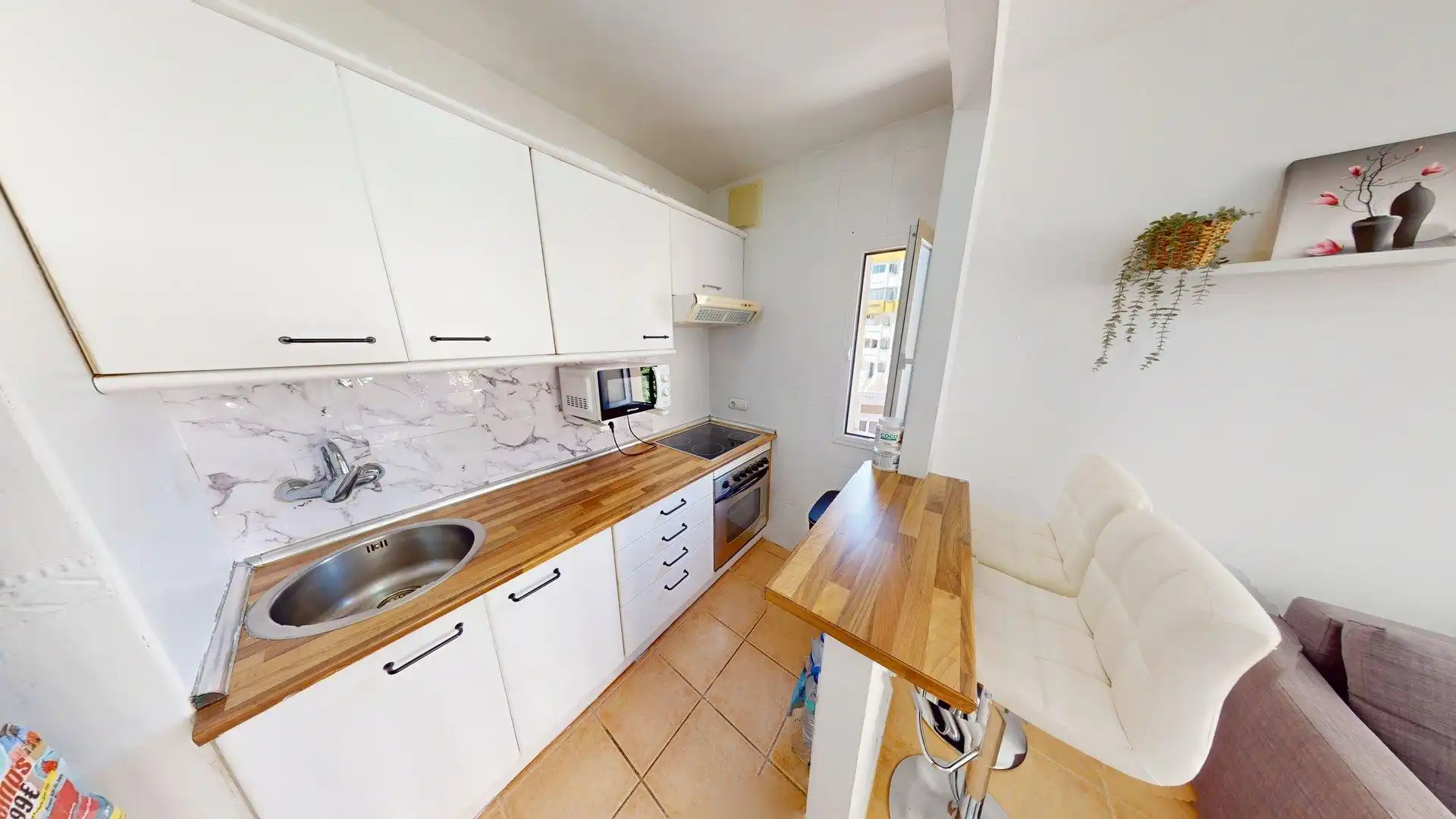Kitchen of Flat for sale in Benalmádena  with Air Conditioner, Swimming Pool and Furnished