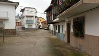 Vista exterior de Casa adosada en venda en Aldeanueva del Camino amb Piscina