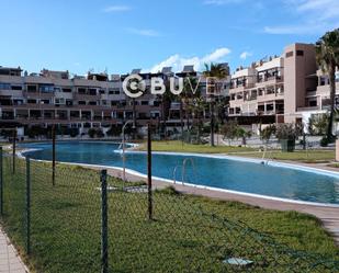 Swimming pool of Single-family semi-detached for sale in  Almería Capital  with Air Conditioner, Heating and Terrace