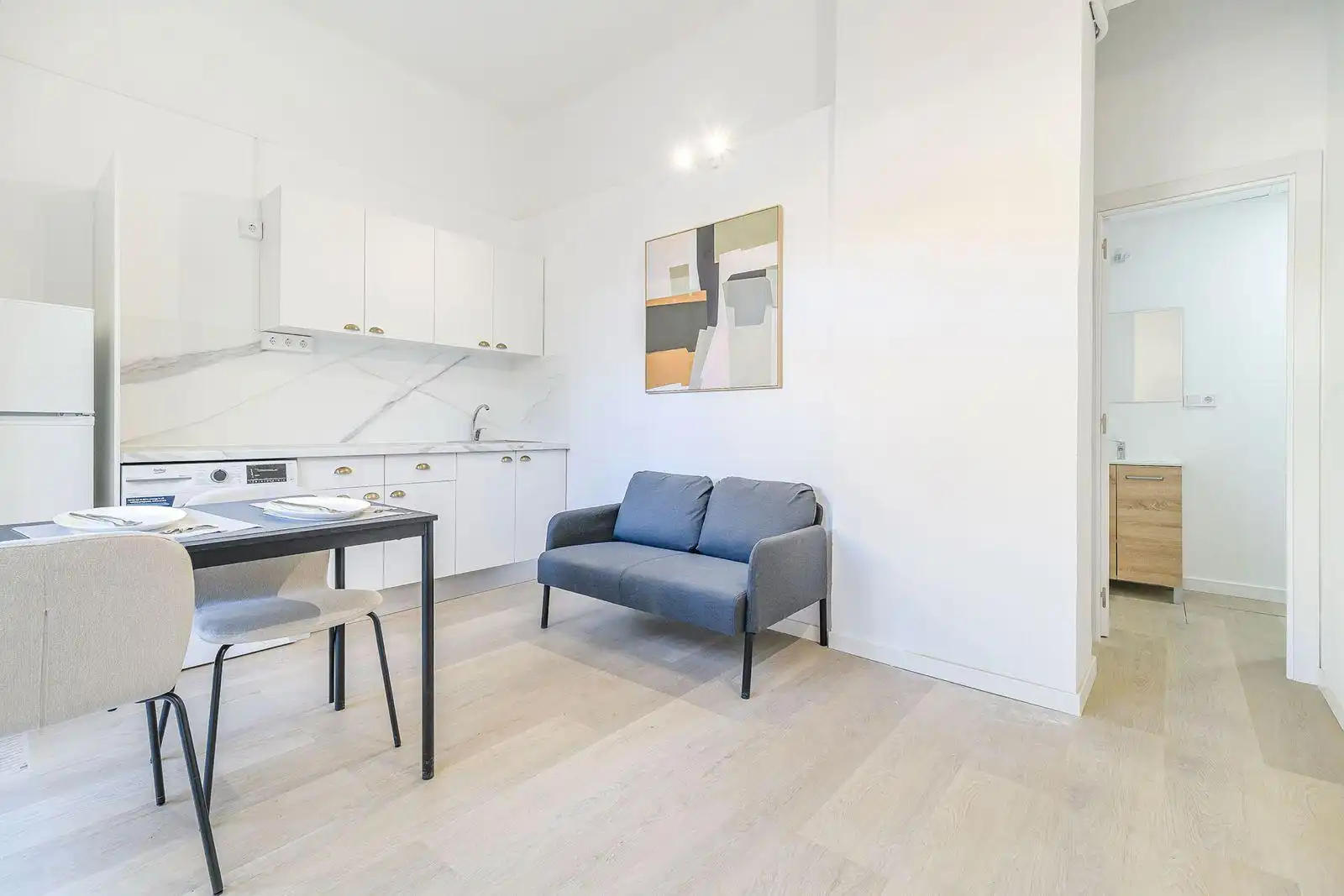 Sala d'estar de Local en venda en Santa Coloma de Gramenet amb Aire condicionat, Parquet i Moblat