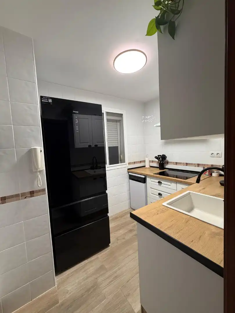 Kitchen of Flat for sale in Alcalá de Guadaira  with Air Conditioner, Terrace and Storage room