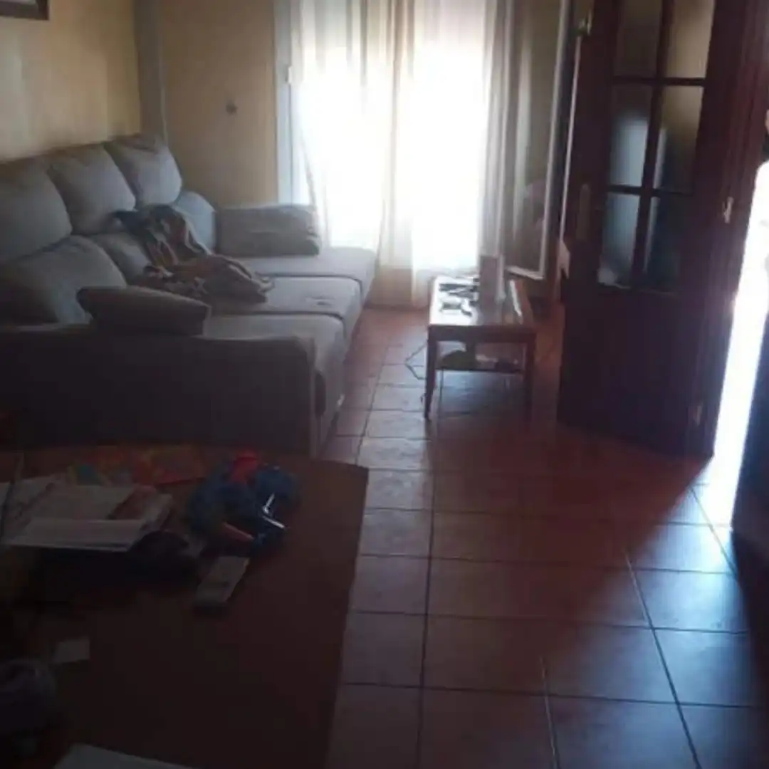 Sala d'estar de Casa o xalet en venda en Dos Hermanas amb Aire condicionat, Jardí privat i Moblat