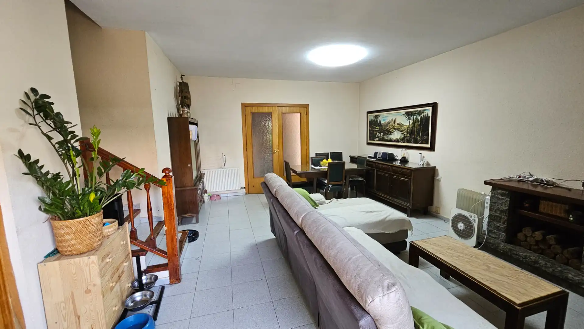 Sala d'estar de Casa adosada en venda en Sabadell amb Calefacció, Terrassa i Forn