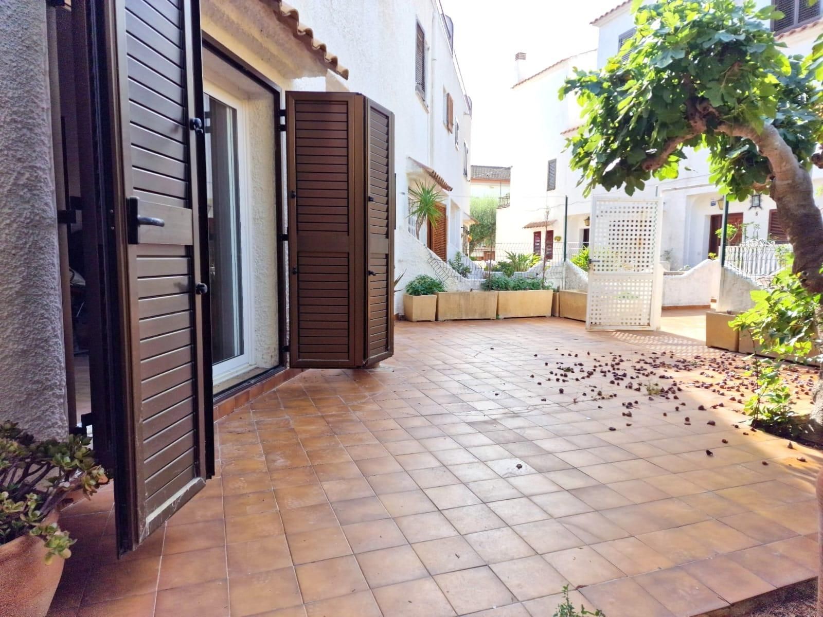 Exterior view of Single-family semi-detached for sale in Calafell  with Private garden, Terrace and Storage room
