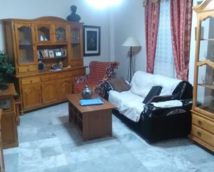 Sala d'estar de Casa adosada en venda en Brenes amb Aire condicionat