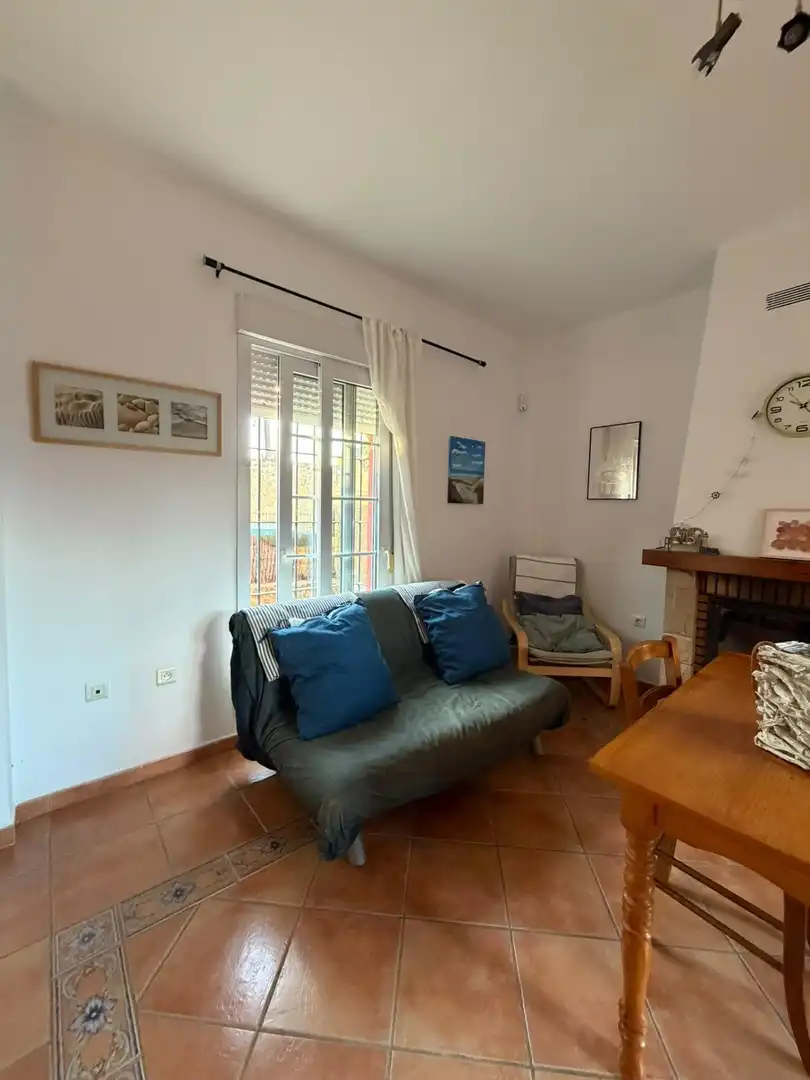 Sala de estar de Casa adosada en venta en Islantilla con Jardín privado, Terraza y Trastero