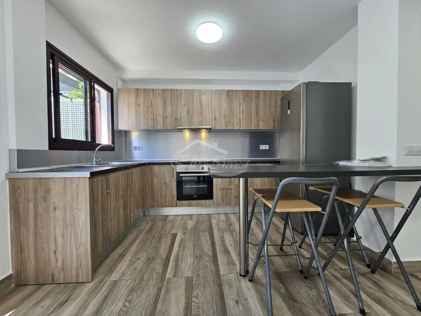 Cocina de Casa adosada en venta en El Tanque con Aire acondicionado, Jardín privado y Terraza