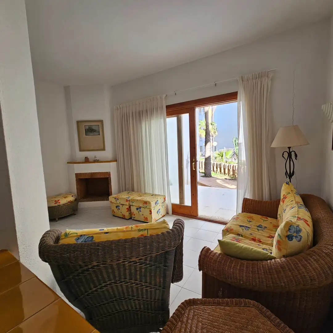 Sala d'estar de Casa adosada en venda en La Manga del Mar Menor amb Jardí privat, Terrassa i Moblat