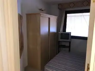 Dormitori de Apartament de lloguer en Sevilla amb Aire condicionat, Moblat i Forn
