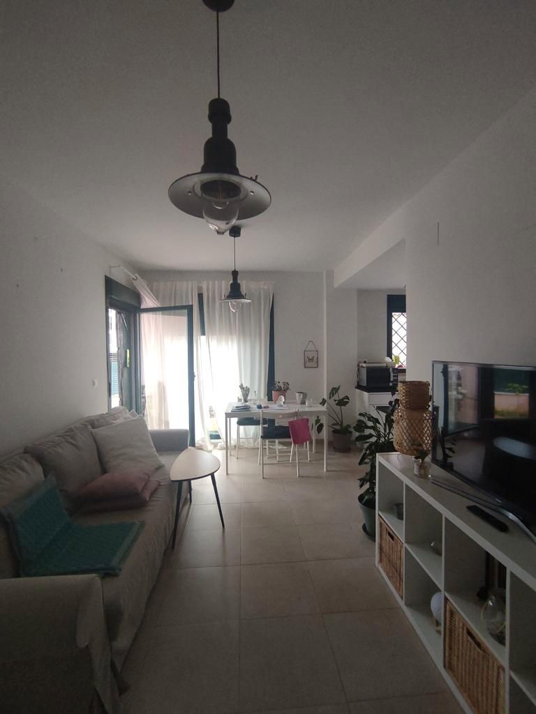 Sala d'estar de Pis de lloguer en Málaga Capital amb Aire condicionat, Jardí privat i Moblat