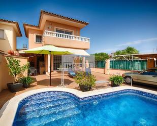 Exterior view of House or chalet for sale in Empuriabrava  with Air Conditioner and Swimming Pool