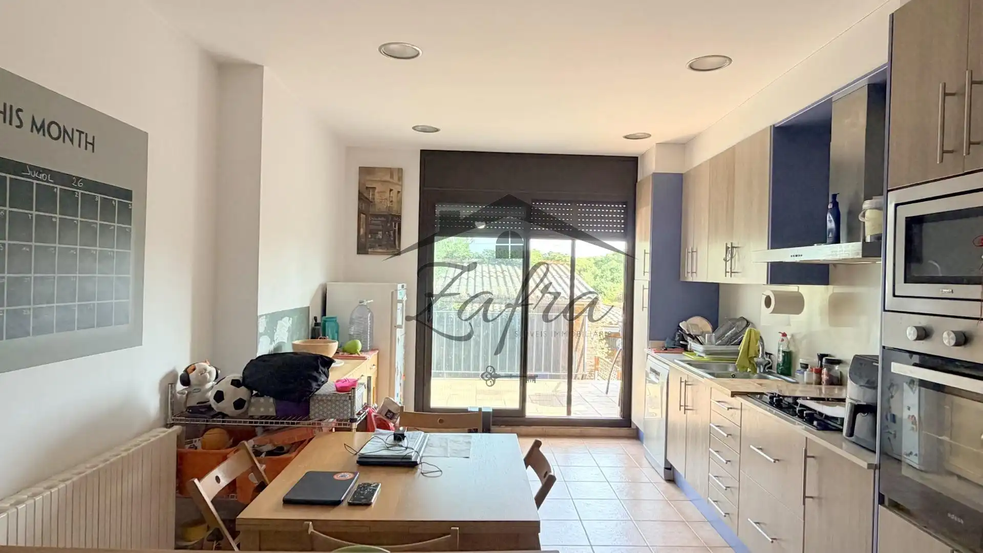 Cuina de Casa adosada en venda en Llagostera amb Calefacció i Terrassa