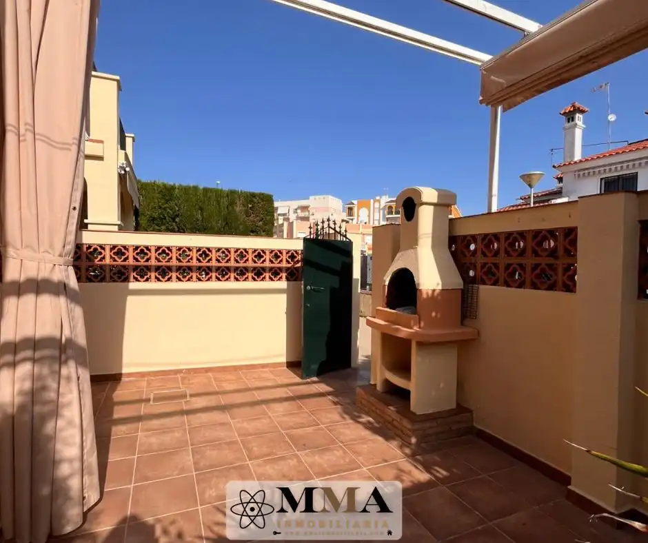 Terrassa de Casa adosada en venda en El Portil amb Aire condicionat, Calefacció i Jardí privat