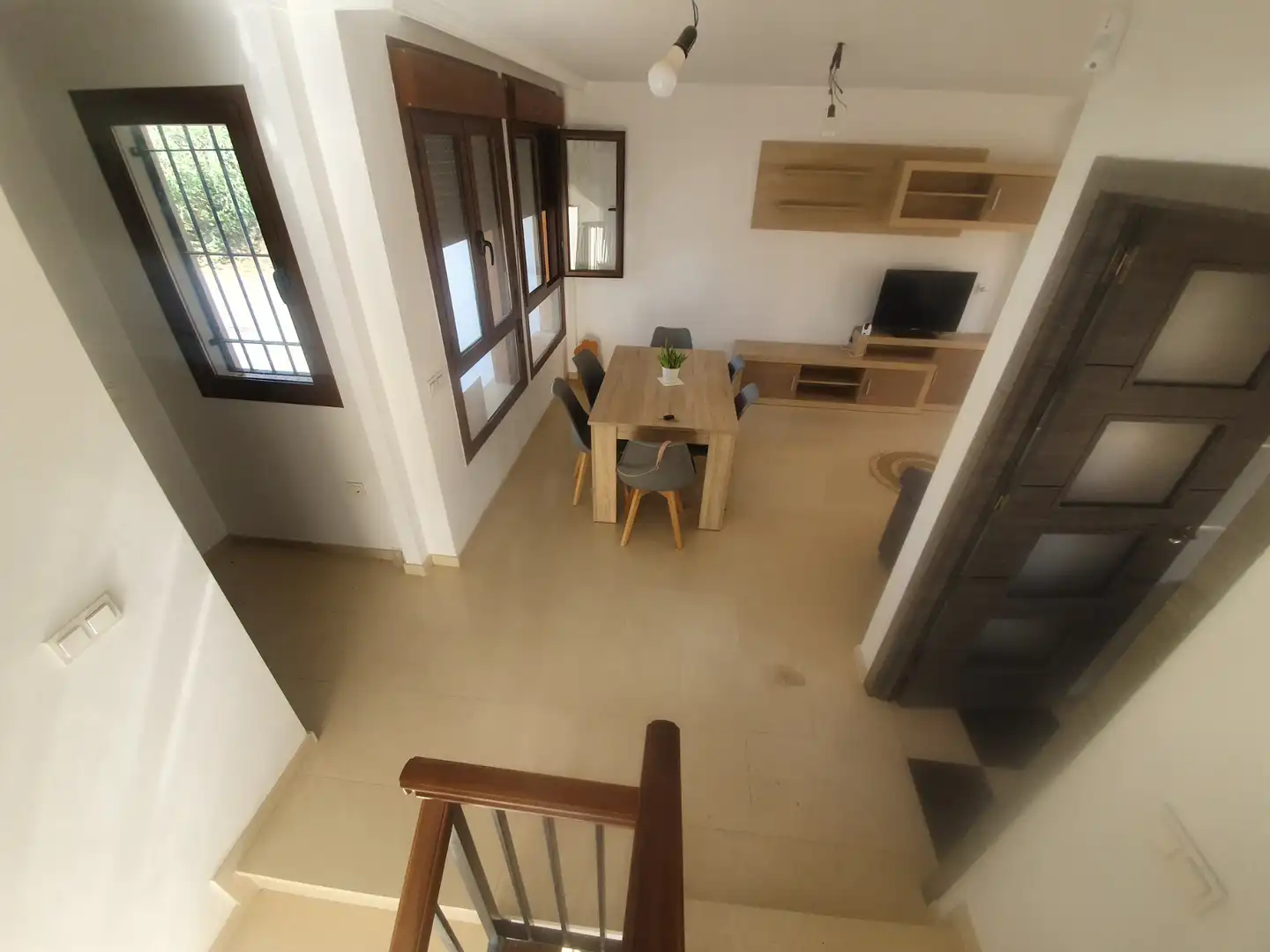 Sala d'estar de Casa adosada en venda en Guadix amb Terrassa, Traster i Moblat
